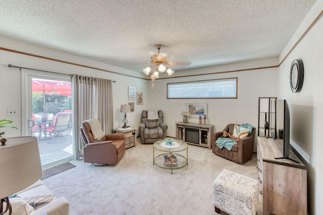 2934 N 8th St, Fresno, CA 93703 - carpeted living room featuring a textured ceiling