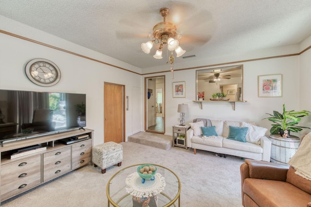 2934 N 8th St, Fresno, CA 93703 - living room with light colored carpet, ceiling fan, and a textured ceiling