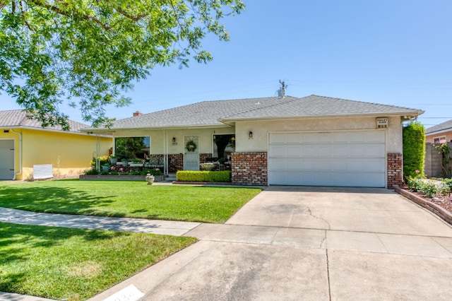 2934 N 8th St, Fresno, CA 93703 - ranch-style house featuring brick siding, a garage, a front lawn, concrete driveway, and stucco siding