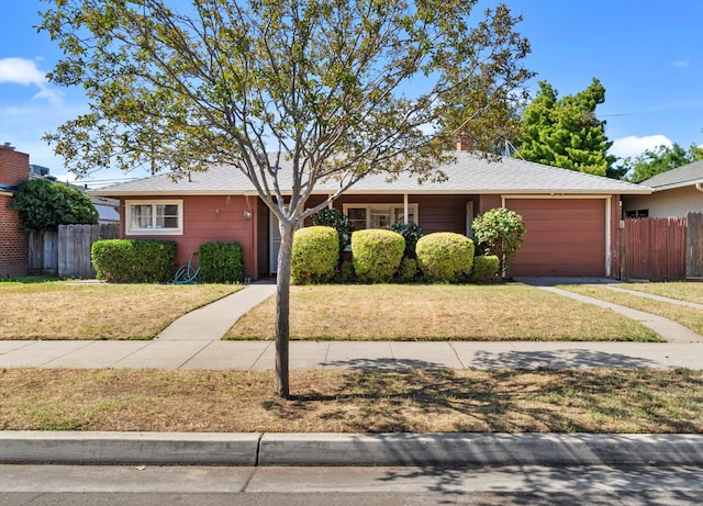 2626 E Princeton Ave, Fresno, CA 93703 - ranch-style house featuring a garage