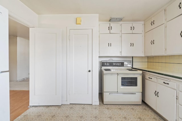 2626 E Princeton Ave, Fresno, CA 93703 - kitchen with white appliances, white cabinetry, tile counters, and backsplash