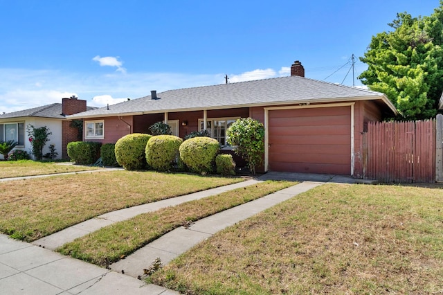 2626 E Princeton Ave, Fresno, CA 93703 - ranch-style home featuring an attached garage, a chimney, and driveway