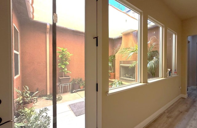 3257 Twain Ave, Clovis, CA 93619 - doorway to outside featuring wood finished floors and baseboards
