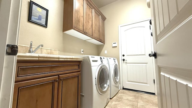 3257 Twain Ave, Clovis, CA 93619 - laundry area with cabinet space, separate washer and dryer, and light tile patterned floors