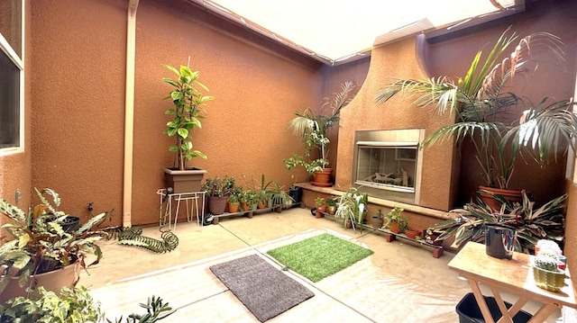 3257 Twain Ave, Clovis, CA 93619 - view of patio / terrace with a glass covered fireplace