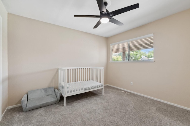 2051 E Fremont, Fresno, CA 93710 - bedroom with carpet, baseboards, and ceiling fan