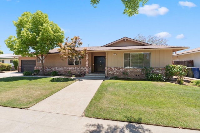 2051 E Fremont, Fresno, CA 93710 - single story home with brick siding, a front yard, and a garage