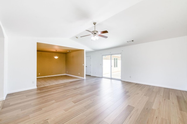 5164 W Michigan Ave, Fresno, CA 93722 - empty room featuring light wood finished floors, vaulted ceiling, ceiling fan, and baseboards