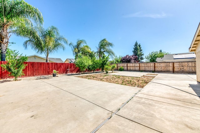 5164 W Michigan Ave, Fresno, CA 93722 - fenced backyard featuring a patio