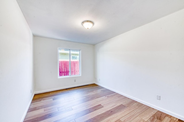 5164 W Michigan Ave, Fresno, CA 93722 - unfurnished room featuring wood finished floors and baseboards