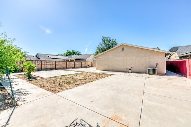 5164 W Michigan Ave, Fresno, CA 93722 - fenced backyard with a patio area and central AC unit