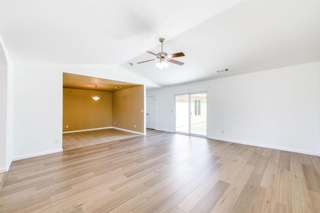 5164 W Michigan Ave, Fresno, CA 93722 - spare room featuring vaulted ceiling, light wood-type flooring, a ceiling fan, and baseboards