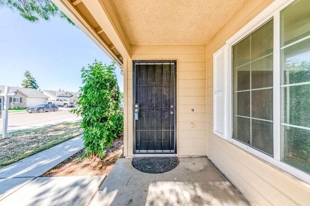 5164 W Michigan Ave, Fresno, CA 93722 - doorway to property with a residential view