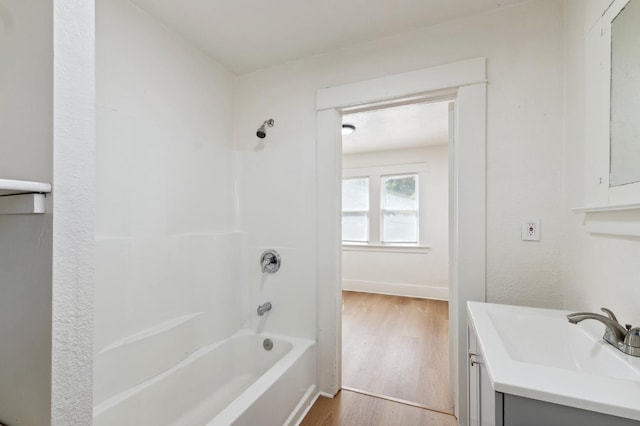 1593 N Glenn Ave, Fresno, CA 93728 - bathroom featuring vanity, shower / bath combination, and wood finished floors