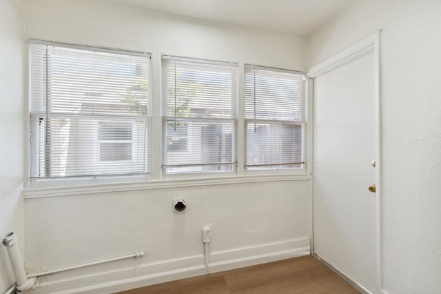 1593 N Glenn Ave, Fresno, CA 93728 - empty room with wood finished floors and plenty of natural light
