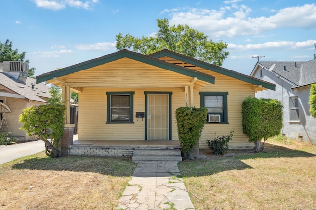 1593 N Glenn Ave, Fresno, CA 93728 - view of front of home featuring covered porch and a front lawn