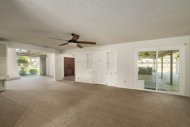 2081 Santa Ana Ave, Clovis, CA 93611 - carpeted empty room with ceiling fan, a textured ceiling, and baseboards
