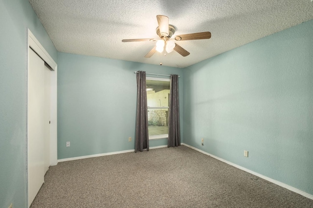 2081 Santa Ana Ave, Clovis, CA 93611 - unfurnished bedroom with a textured ceiling, carpet flooring, ceiling fan, a closet, and baseboards