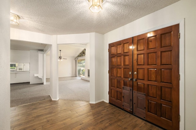 2081 Santa Ana Ave, Clovis, CA 93611 - entryway with a textured ceiling, ceiling fan, baseboards, and dark wood finished floors