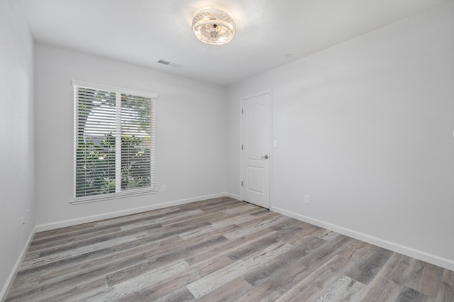 3752 N Augusta St, Fresno, CA 93726 - spare room with wood finished floors and baseboards