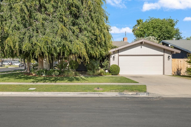 3752 N Augusta St, Fresno, CA 93726 - view of front of property featuring a garage and driveway