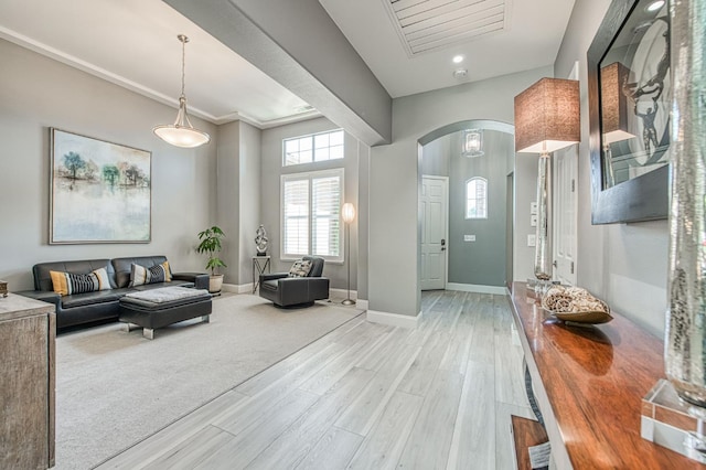 3081 Serena Ave, Clovis, CA 93619 - entryway featuring arched walkways, light wood-type flooring, and baseboards