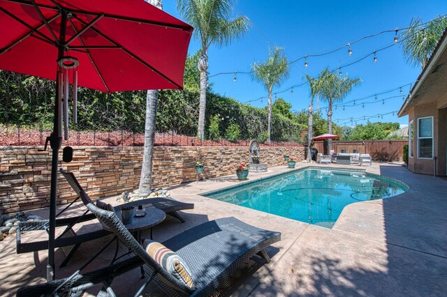 3081 Serena Ave, Clovis, CA 93619 - view of pool featuring a patio area and a fenced backyard