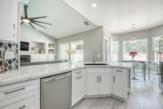 3081 Serena Ave, Clovis, CA 93619 - kitchen featuring dishwasher, a sink, ceiling fan, white cabinetry, and light stone countertops