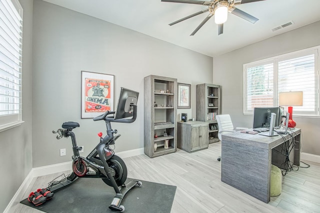 3081 Serena Ave, Clovis, CA 93619 - home office with ceiling fan, baseboards, and light wood-style floors