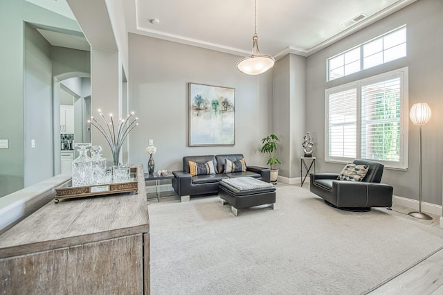 3081 Serena Ave, Clovis, CA 93619 - living room with arched walkways, healthy amount of natural light, and baseboards