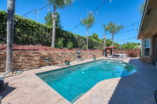 3081 Serena Ave, Clovis, CA 93619 - view of pool featuring a patio area and a fenced backyard