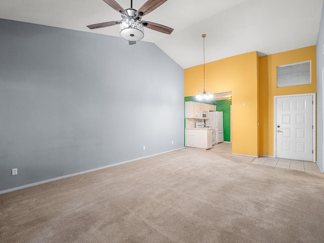 474 E Alluvial Ave Unit 139, Fresno, CA 93720 - unfurnished living room with high vaulted ceiling, light colored carpet, ceiling fan, baseboards, and a chandelier