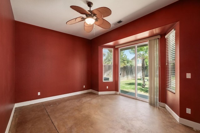 1698 E Wallington Ln, Fresno, CA 93730 - unfurnished room with concrete floors, baseboards, and a ceiling fan