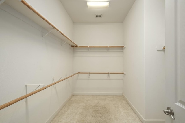 1698 E Wallington Ln, Fresno, CA 93730 - walk in closet featuring light colored carpet
