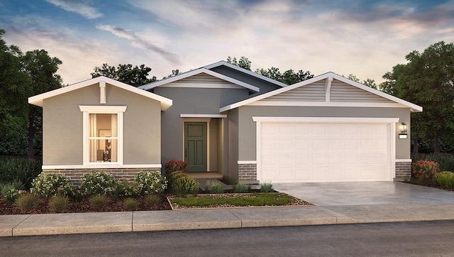 2058 Catherine Ave Unit 2046S, Sanger, CA 93657 - view of front of house featuring an attached garage, concrete driveway, and stucco siding