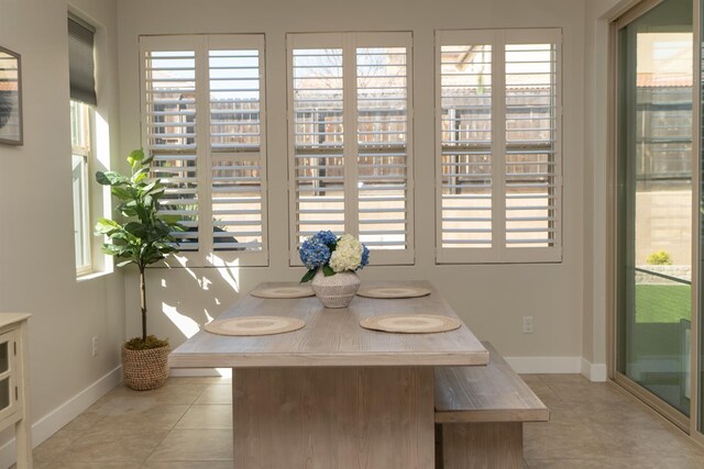 385 Fir St W, Madera, CA 93636 - dining area featuring light tile patterned floors and baseboards