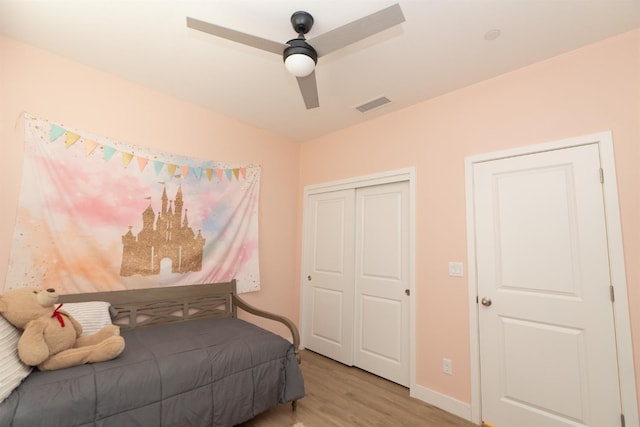 385 Fir St W, Madera, CA 93636 - bedroom featuring light wood-type flooring, a closet, a ceiling fan, and baseboards