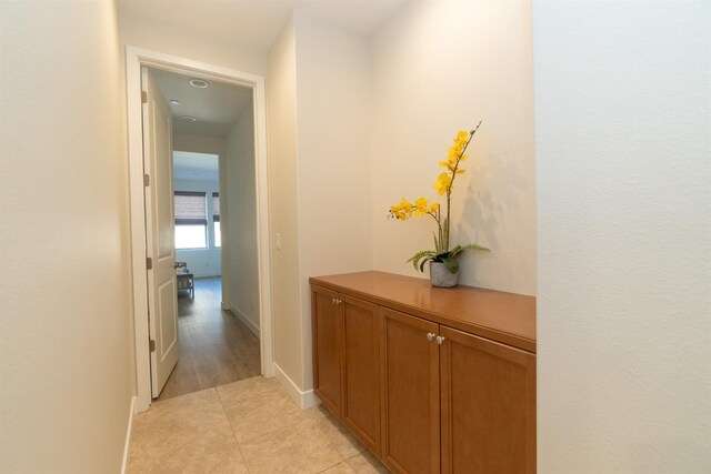 385 Fir St W, Madera, CA 93636 - hallway featuring light tile patterned floors and baseboards