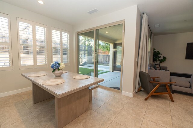 385 Fir St W, Madera, CA 93636 - dining space with baseboards, light tile patterned floors, and recessed lighting