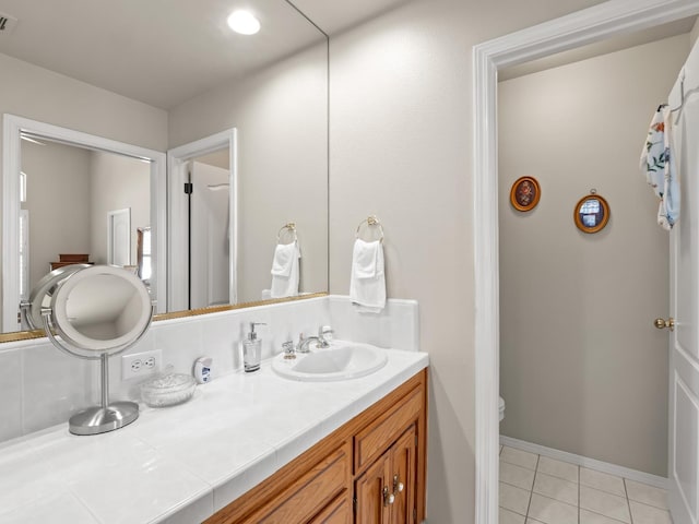 6424 N Allison Ln, Fresno, CA 93711 - bathroom with toilet, vanity, and tile patterned flooring