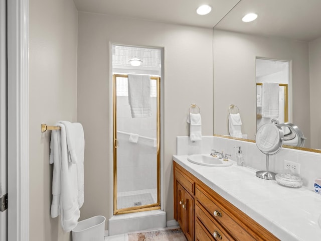 6424 N Allison Ln, Fresno, CA 93711 - full bath featuring double vanity, a shower stall, and recessed lighting