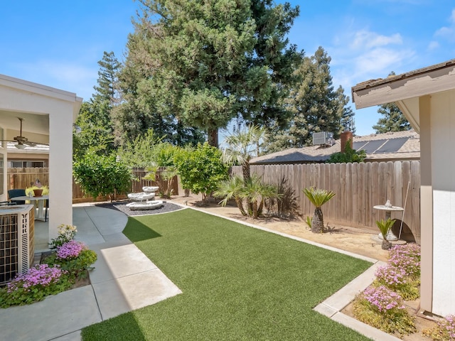 6424 N Allison Ln, Fresno, CA 93711 - view of yard with central AC unit, a patio, and ceiling fan