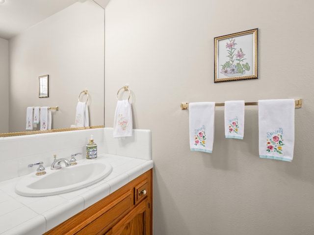 6424 N Allison Ln, Fresno, CA 93711 - bathroom featuring vanity and backsplash