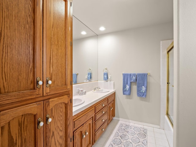 6424 N Allison Ln, Fresno, CA 93711 - full bathroom featuring double vanity, tile patterned flooring, recessed lighting, and shower / bath combination with glass door