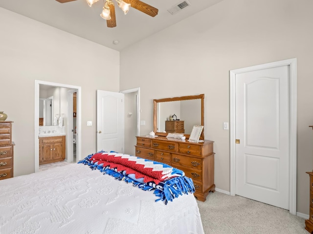 6424 N Allison Ln, Fresno, CA 93711 - bedroom featuring a towering ceiling, light colored carpet, connected bathroom, baseboards, and ceiling fan