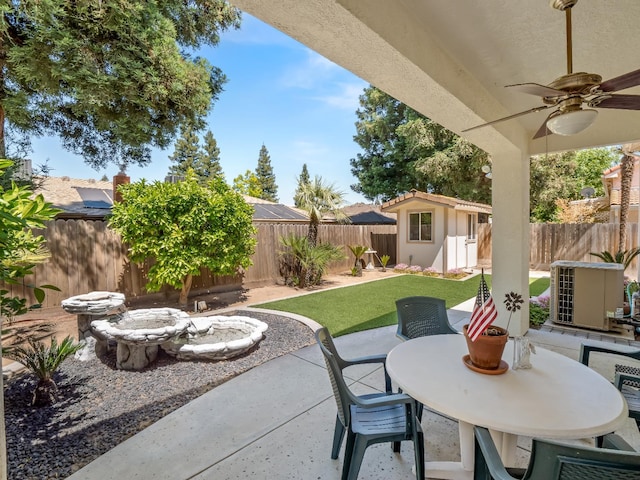 6424 N Allison Ln, Fresno, CA 93711 - view of patio featuring outdoor dining area, central AC, ceiling fan, and an outdoor structure