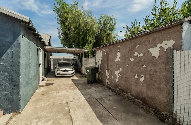 2216 E Floradora Ave, Fresno, CA 93703 - view of side of property with concrete driveway