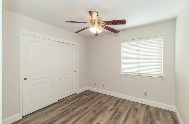 1783 E Pryor Dr, Fresno, CA 93720 - unfurnished bedroom featuring wood finished floors, baseboards, a closet, and ceiling fan