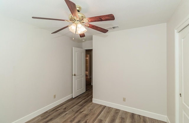 1783 E Pryor Dr, Fresno, CA 93720 - unfurnished bedroom featuring baseboards, wood finished floors, and a ceiling fan