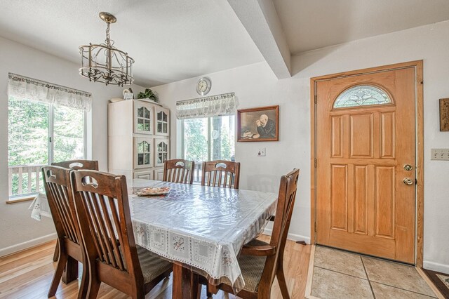 42357 Hanging Branch Rd, Shaver Lake, CA 93664 - dining area with baseboards, a chandelier, and light wood-type flooring